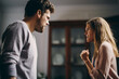© xartproduction - family quarrel and abuse. man and woman arguing and yelling at each other.