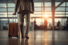 Rear View Of An Unrecognizable Man In A Suit Businessman With A Suitcase At The Airport, Close-up . Travel, Business Trip Concept With Copy Space