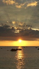 Wall Mural - beautiful landscape with sunset on the tropical beach, thailand. vertical video