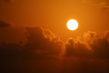 Wall Mural - sunrise on the sky with sun shine ray pass orange cloud in the morning