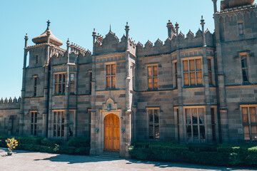 View of ancient building with graywalls and orange graphic paintings