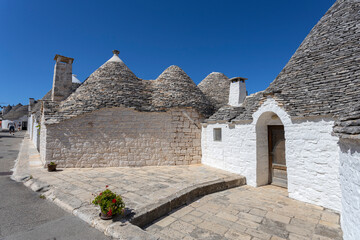 Wall Mural - The Trulli of Alberobello, the typical limestone houses in the province of Bari, Puglia, Italy