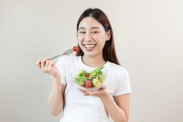 Wall Mural - Asian females eating salad as breakfast for good health