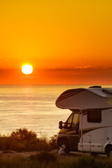 Canvas Print - Caravan on sea at sunrise.