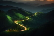 Illuminated Road Among The Mountains.