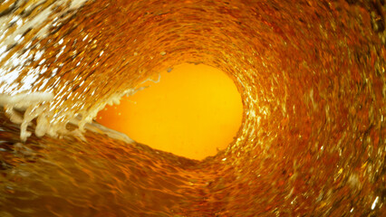 Freeze Motion Shot of Whisky or Cider Vortex at 1000 fps.