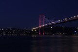 Fototapeta  - Awesome Panoramic view of Istanbul Bosphorus on sunset. Istanbul Bosphorus Bridge (15 July Martyrs Bridge. Turkish: 15 Temmuz Sehitler Koprusu). Beautiful landscape Turkey.