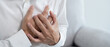 © Shisu_ka - hand hold chest with heart attack symptoms, asian woman have chest pain caused by heart disease, leak, dilatation, enlarged coronary heart, press on the chest with a painful expression