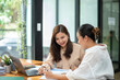 © Wasana - Two colleague businesswoman discussion and brainstorming business ideas. Consulting and marketing planning