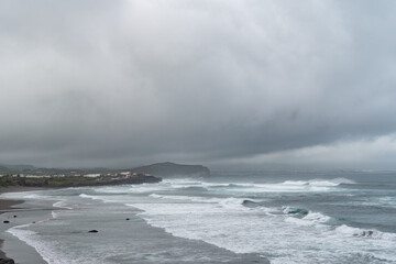 Sea coming in waves on the shore in the Azores of Portugal.