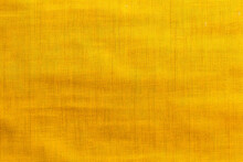 Yellow Fabric Texture With Subtle Horizontal Lines And Variations Close Up