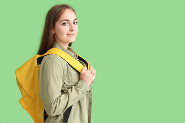 Canvas Print - Female student on green background