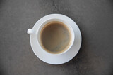 Fototapeta Mapy - cup of coffee on table