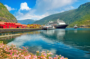 Wall Mural - View of wharf in Flam with moored cruise ship. Sognefjord, Aurlandfjord, Norway