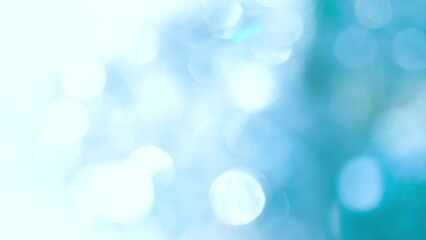 Wall Mural - Slow Swirling Bokeh in Blue Space. Loop. A large number of sparkling faceted crystals shimmer and create romantic bokeh