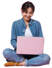 Young Asian college student sits cross-legged on floor working with a laptop computer, looking directly at the camera in a studio shot on a isolated background