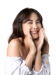 Wall Mural - Young Asian woman doing a shocked surprise gesture shouting with hands cupped around mouth isolated background