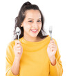 Young beauty Asian woman showing spoon and fork prepare to eat food and she wearing a yellow sweater shot isolated on white background