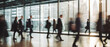 © JKLoma - Group of people working in the office, people walking, motion blur
