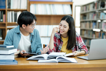 Wall Mural - Young students campus helps friend catching up and learning.