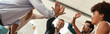 © Friends Stock - Success Business people giving each other high-five and smiling while working together in the modern office