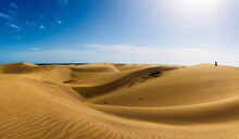 Panoramic View Of Yellow Dunes With Horizon Of The Sea