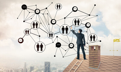 Wall Mural - businessman on house roof presenting networking and connection c