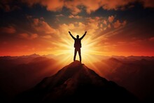 A Silhouette Of A Person Standing On A Mountaintop, Arms Outstretched Towards The Rising Sun, Which Pointing Up As Symbol Of Achievement