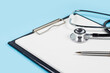© eliosdnepr - Stethoscope and pen laying on patient information blank