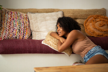 Wall Mural - young african american woman relaxing at home