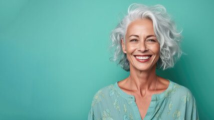 Smiling attractive woman 50s years old look to the camera, isolated on plain green background studio portrait. People lifestyle concept. AI Generated.