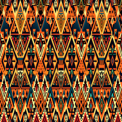 Wall Mural - Tribal vector ornament. Seamless African pattern. Ethnic carpet with chevrons. Aztec style. Geometric mosaic on the tile, majolica. Ancient interior. Modern rug. Geo print on textile. Kente Cloth.
