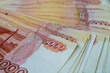 Russian money roubles banknotes, heap of russian rubles. Five-thousandth bills close-up.