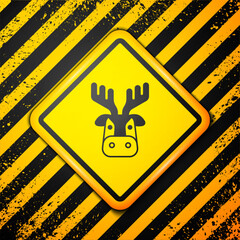 Poster - Black Deer head with antlers icon isolated on yellow background. Warning sign. Vector