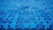 Blue tribunes. seats of tribune on sport stadium. empty outdoor arena. concept of fans. chairs for audience. cultural environment concept. color and symmetry. empty seats. modern stadium
