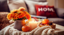 Autumn Still Life With Pumpkins, Candles And Knitted Plaid. Selective Focus. 