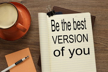 orange sticker, orange mug, notepad with text be the best version of you