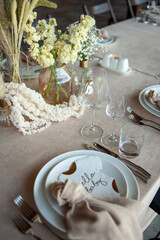 Wall Mural - Beautiful wedding table decorations. Tablewear and bouquet of flowers.