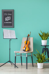 Poster - Chair with violin and note stand in room