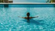 ©  AKA-RA - A woman enjoys swimming in the pool, rear view. Summer vacation and relax. Generative AI