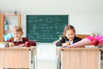 Sticker - Classmates with school cones sitting at desks in classroom