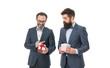 © be free - happy birthday shopping. business partners on meeting isolated on white. businessmen in formal suit on party. success and reward. esthete. bearded men hold valentines present. Pleasant shopping