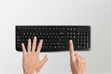 Wall Mural - Business person hands on the computer keyboard