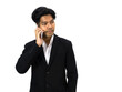 © chadchai - An adult male in a formal two-piece suit is engaging in a phone conversation. In his hand, he holds the modern model of a cellular phone. Portrait on white background with studio lighting. Isolated