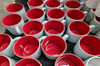 Several red terracotta blended coffee cups