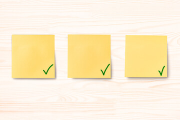 green tick marks on blank sticky notes, priority, process, or instruction. plan step by step. point by point instruction mockup. implementation of plan point by point. banner