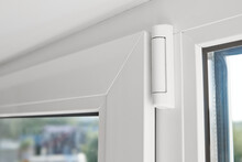 White Hinge Connector Of PVC Window Frame. Window Frame Furniture Elements. Mechanism Of White Plastic Window Sash. Plastic Window Profile Inside