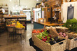 © Wavebreak Media - General view of health food organic grocery shop with counter and boxes with vegetables