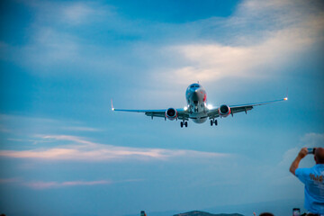 Wall Mural - Airplane arriving at Skiathos airport