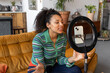 © ReeldealHD images - Female influencer recording a vlog in a cool loft studio apartment
